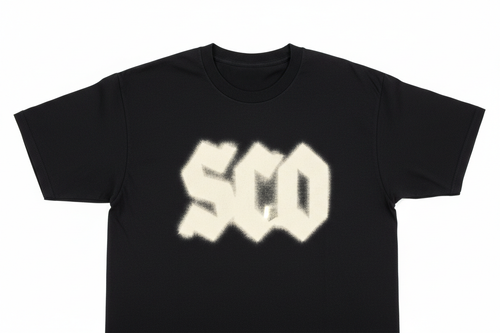 Black cotton tee with discharge-printed bleached cream logo, flat fabric-like surface